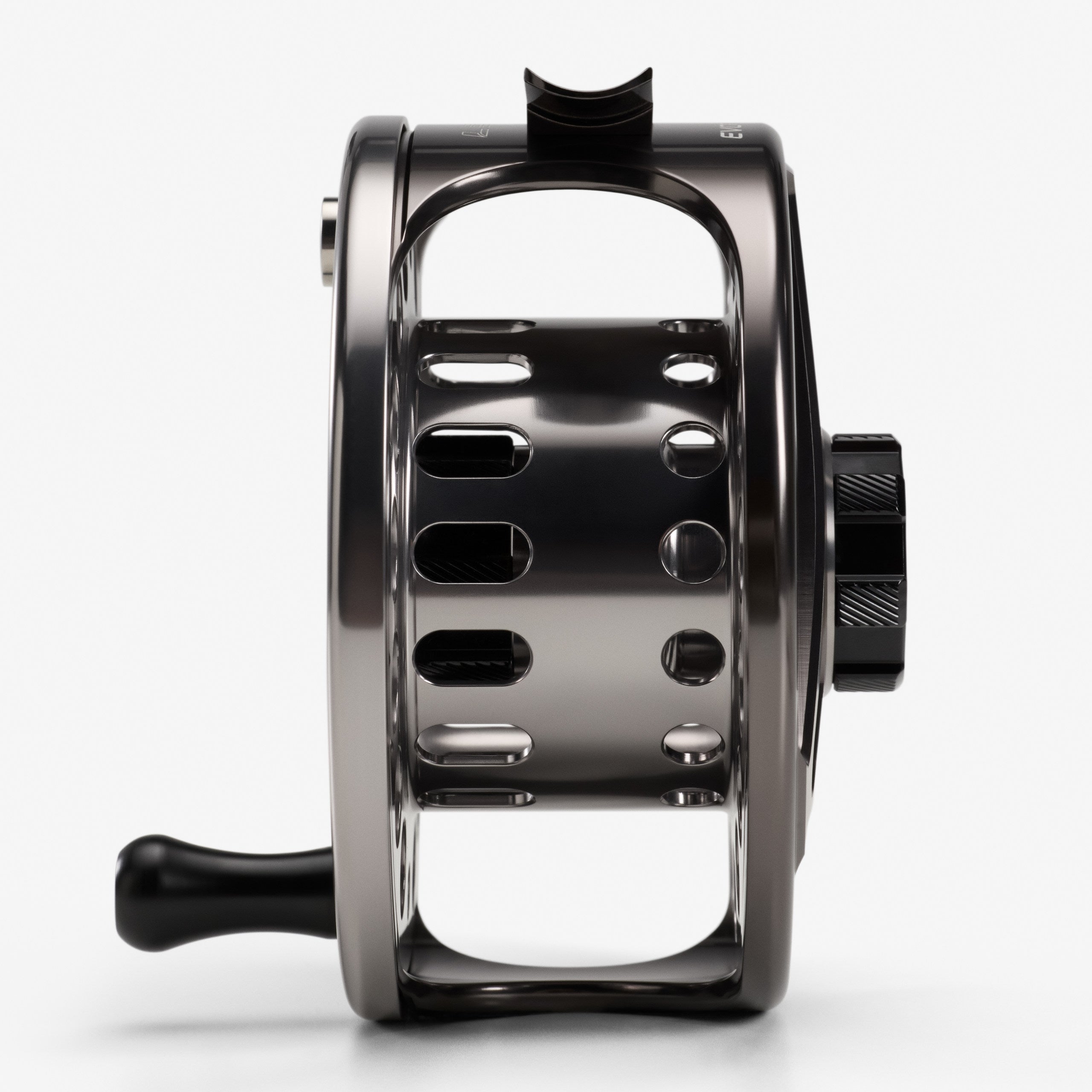 Side view of a LOOP Evotec G5 fly reel showing spool width and drag knob