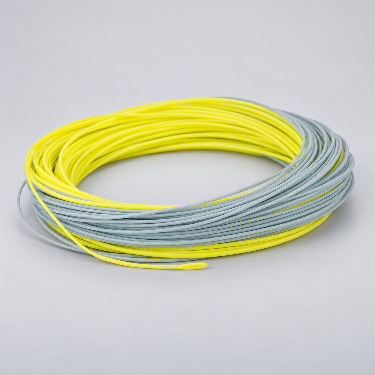 TRAUN RIVER Easy Cast Floating Fly Line, coiled two-tone yellow and grey-blue WF fly line on a light background