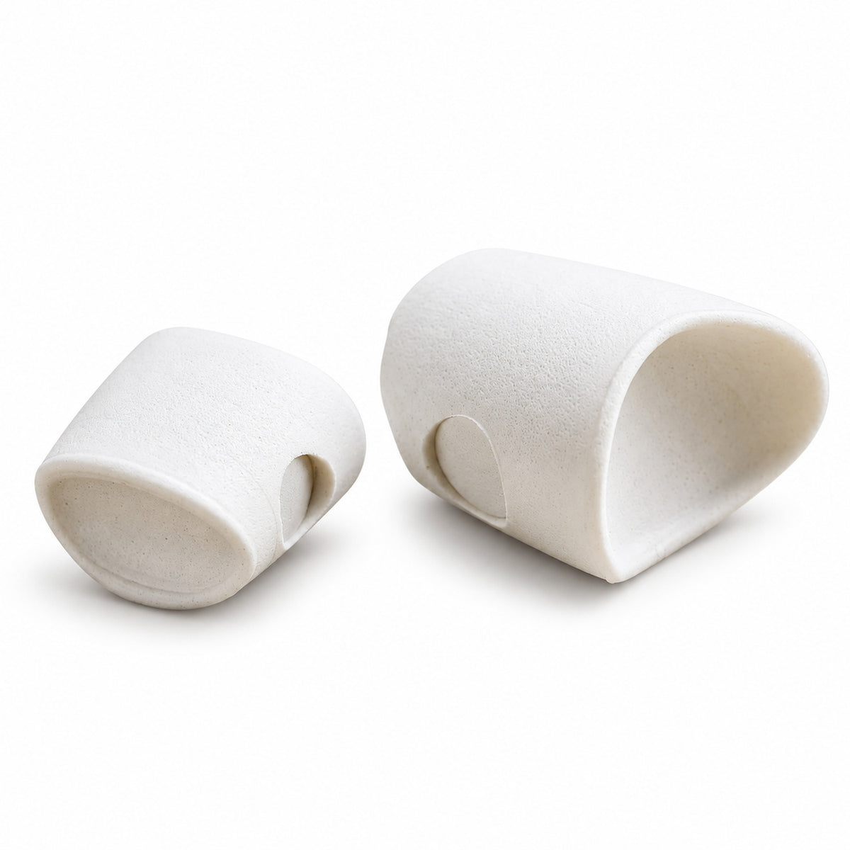 Flymen Surface Seducer Howitzer white EVA foam popper heads with cupped fronts and recessed eye sockets