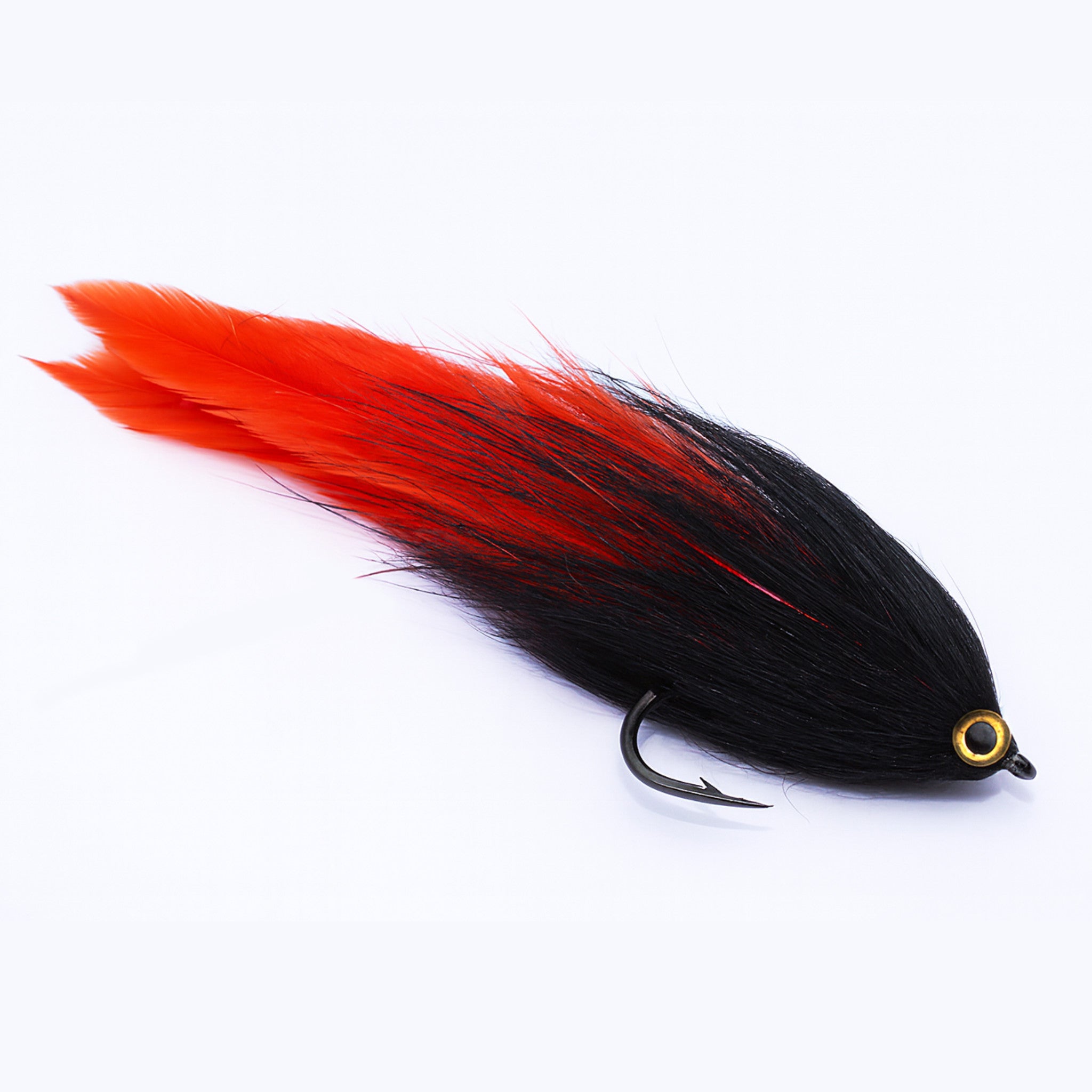 Artificial streamer fly tied on Gamakatsu SL-12S Big Game saltwater fly hook, designed for large predators.