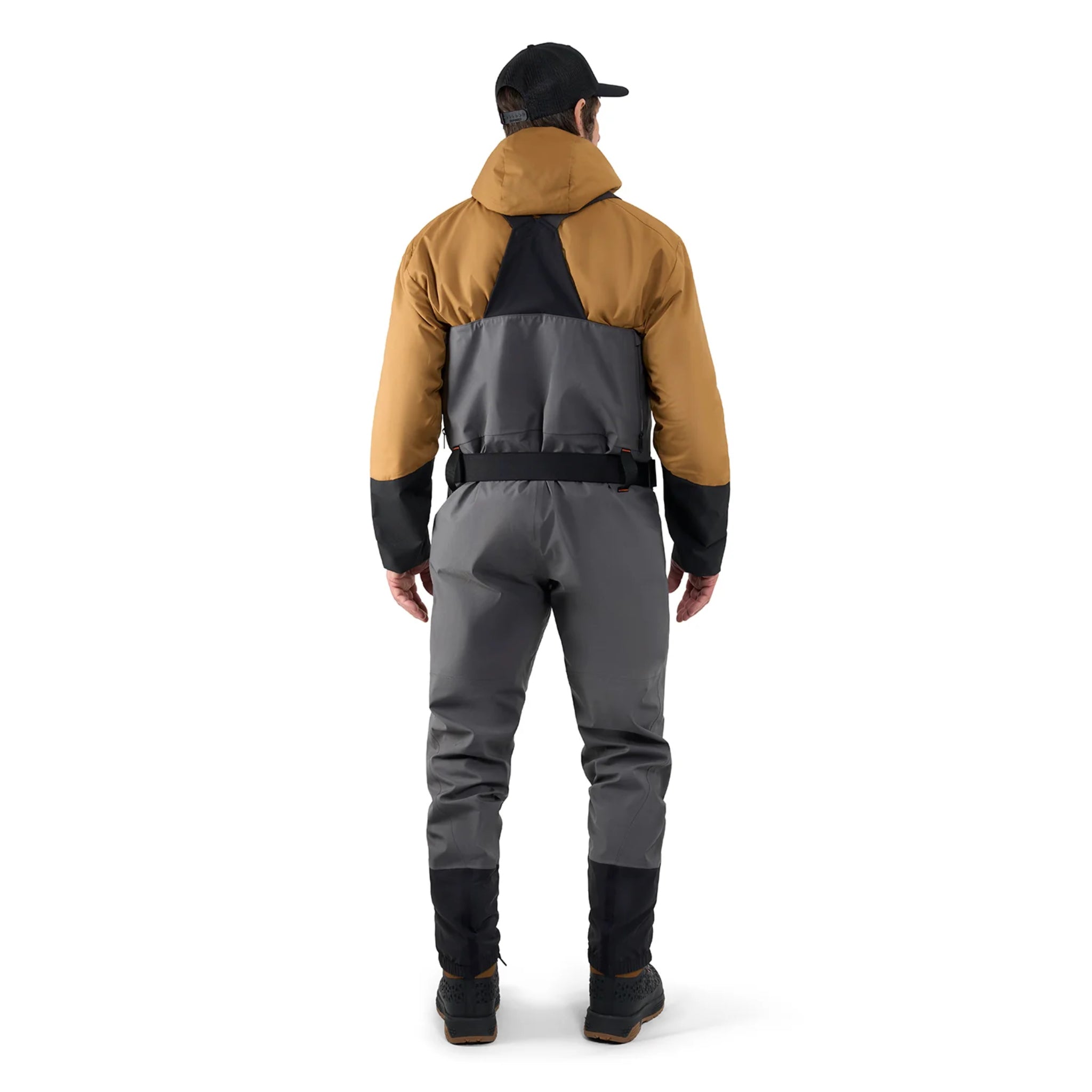 Back view of Grundéns Vector Zip Wader worn by angler near river