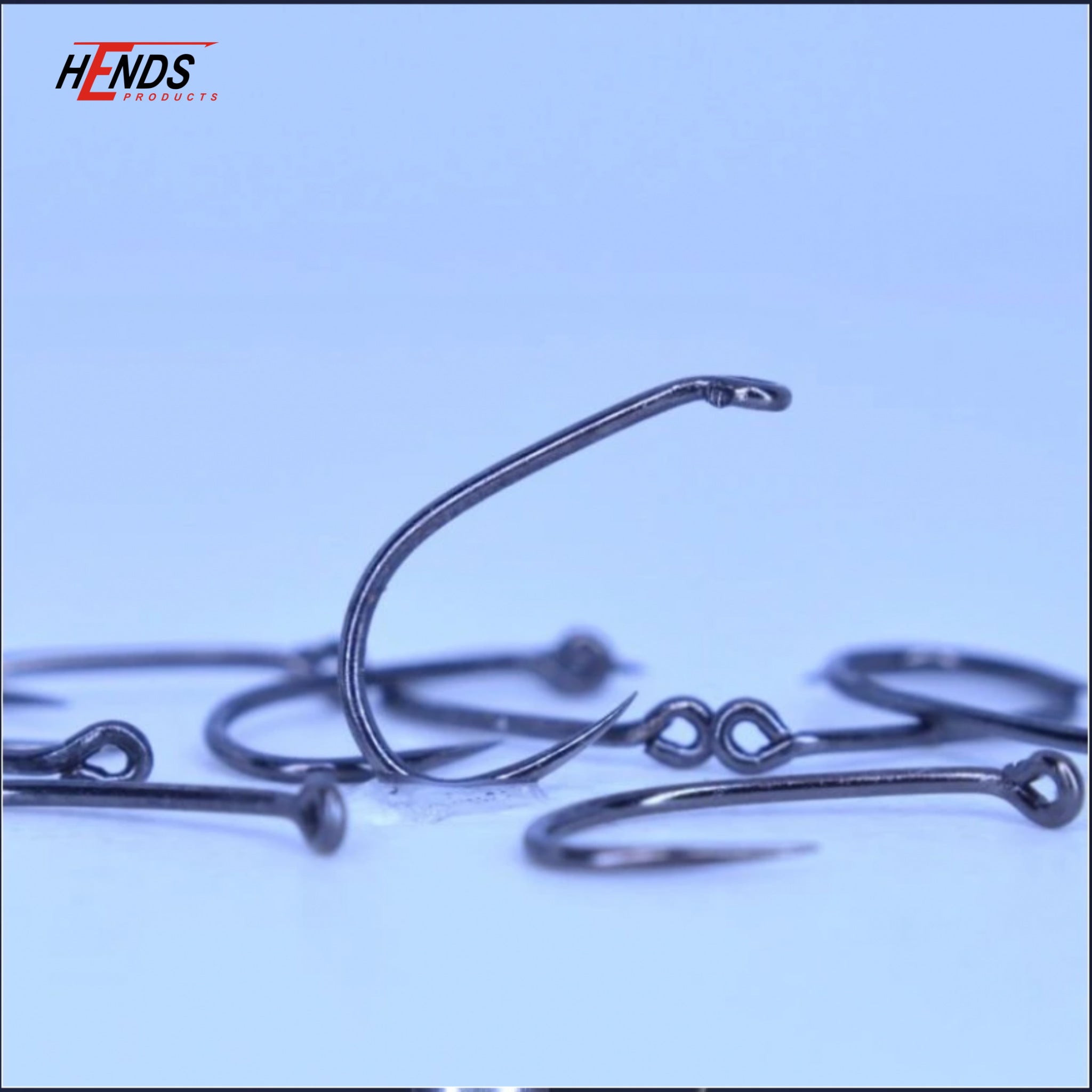 Set of Hends BL334 barbless hooks displayed on a surface