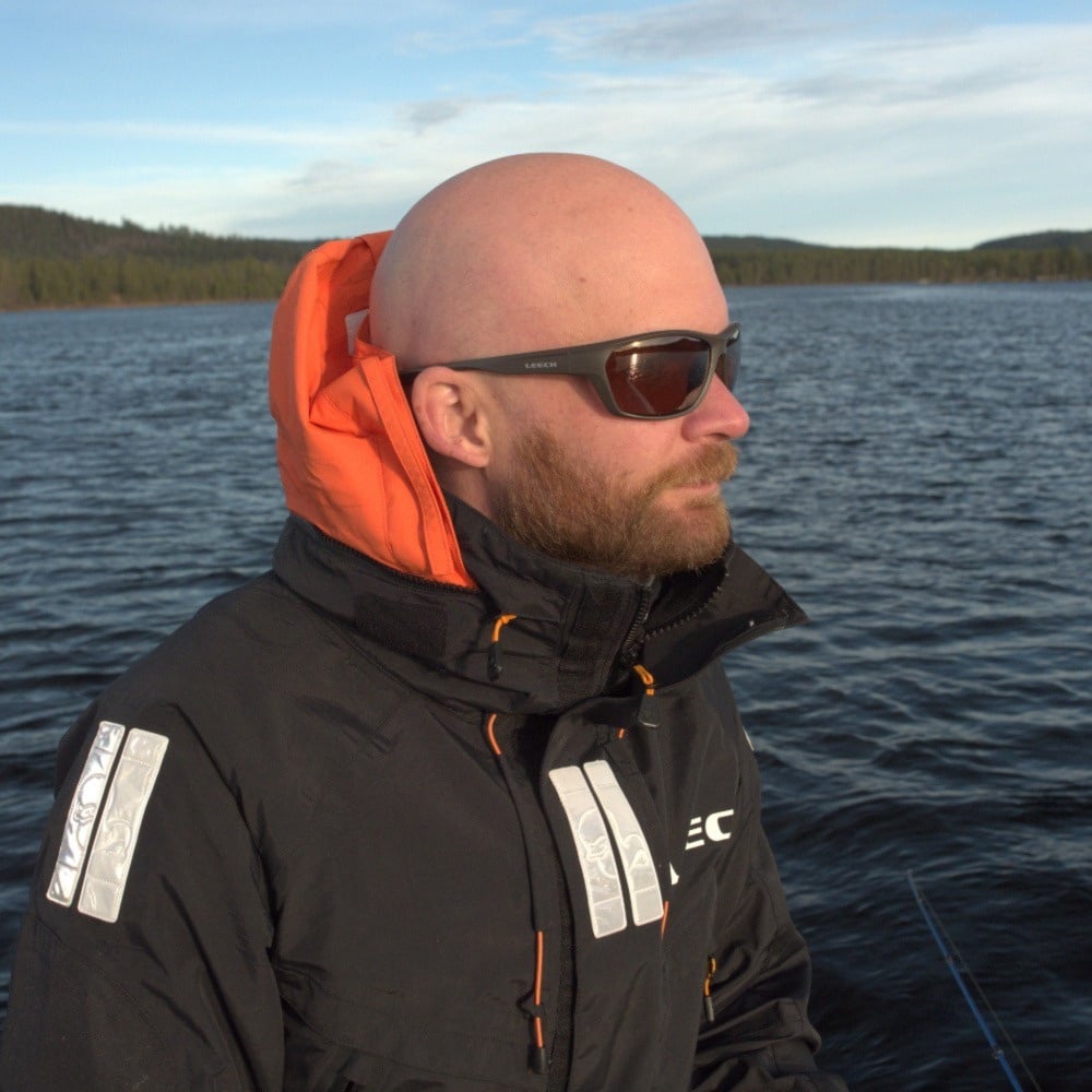 Leech ATW2 Copper polarized fishing sunglasses worn on the water