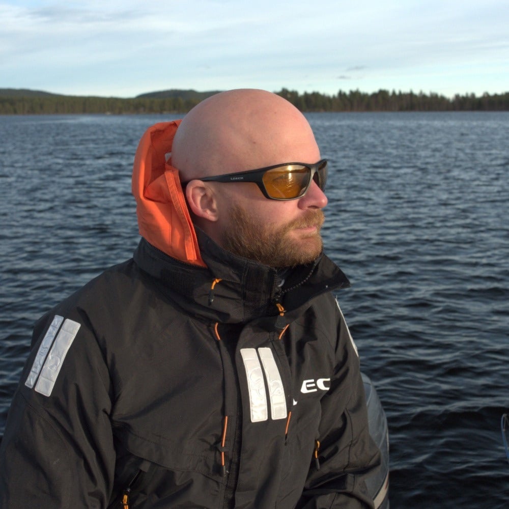 Leech ATW2 Yellow polarized fishing sunglasses worn on the water