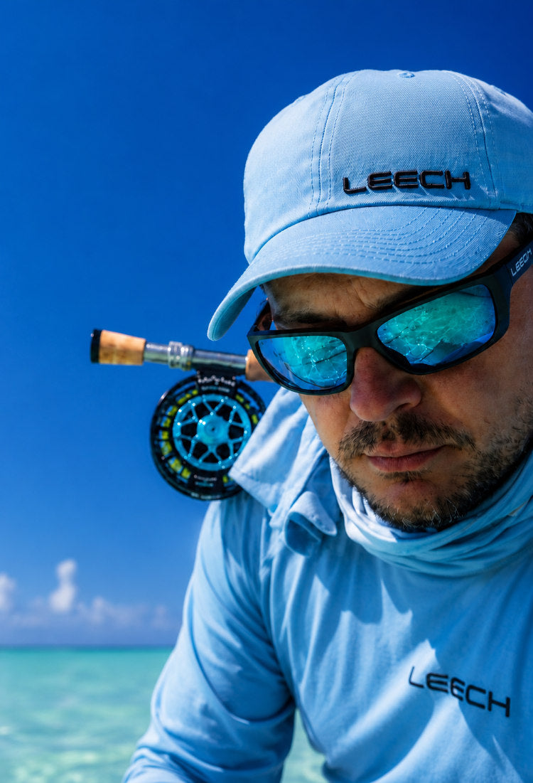 Leech Eyewear polarized fishing sunglasses used by an angler on tropical saltwater flats for improved underwater visibility and glare reduction.