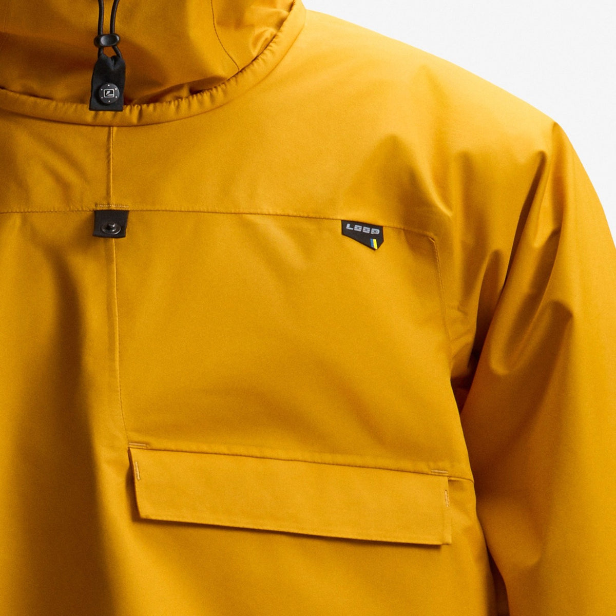 LOOP Anorak Warm Yellow chest pocket detail