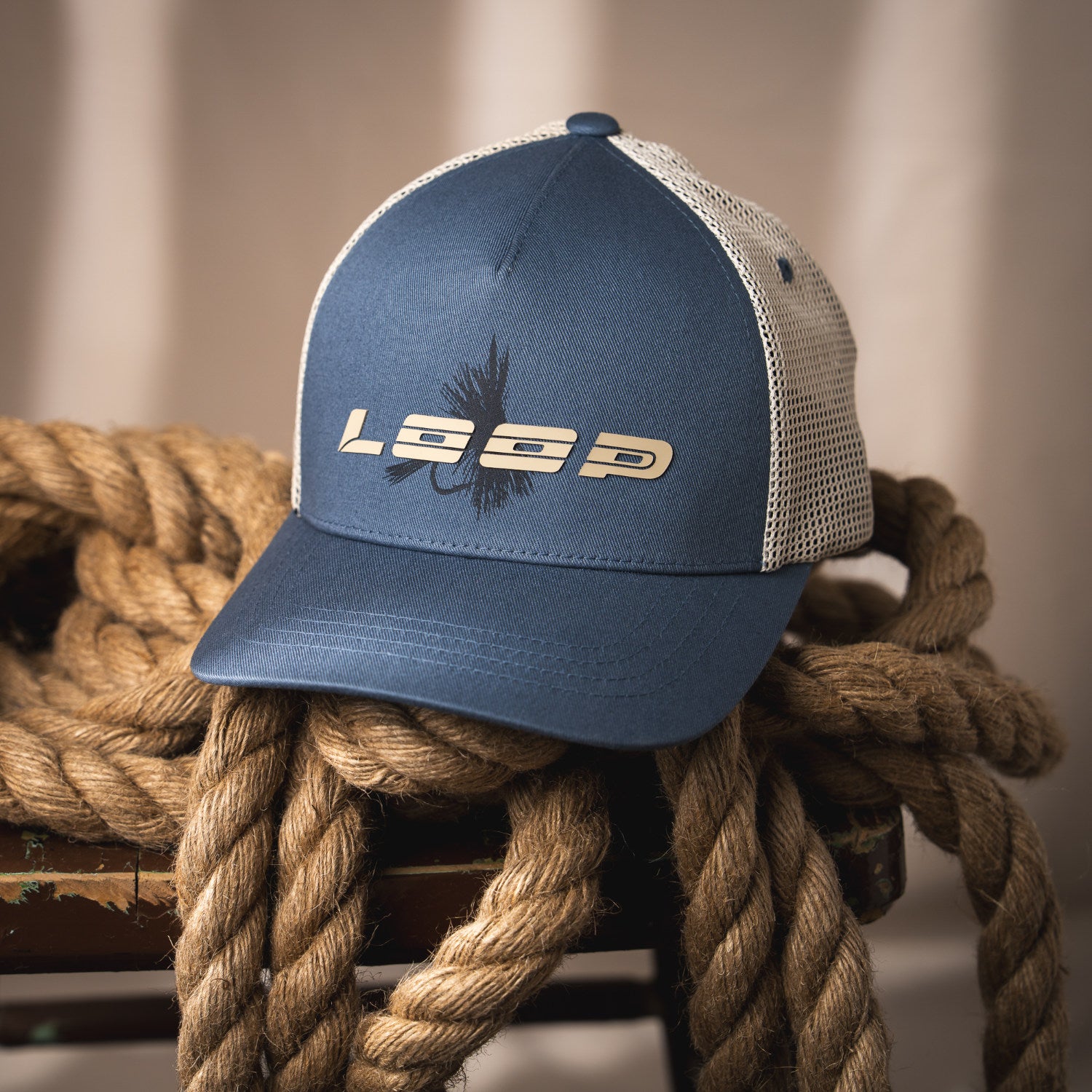 LOOP Fly Trucker Cap Blue Gray lifestyle front view