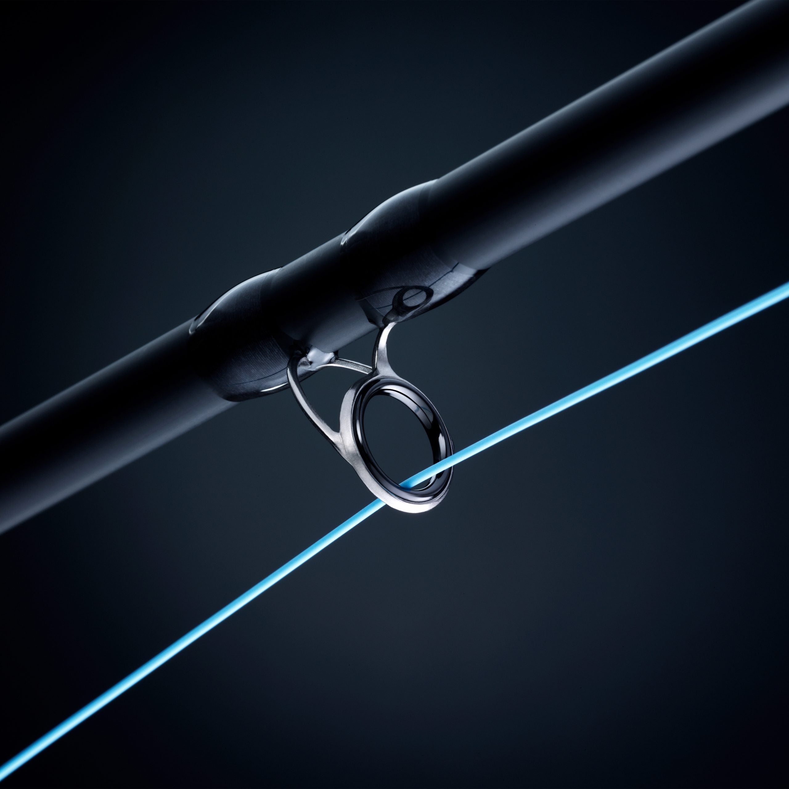 Close-up of a guide and blue fly line on a LOOP Z1 fly rod
