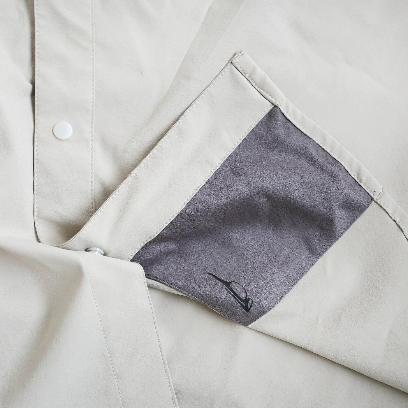 Built-in microfiber glasses cleaner inside the cuff of the RepYourWater Wellfleet shirt