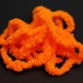 Soldarini Egg’s Chenille 15 mm – farba Fluo Fire Orange, intenzívny fluorescenčný oranžový odtieň pre atraktívne blob mušky.
