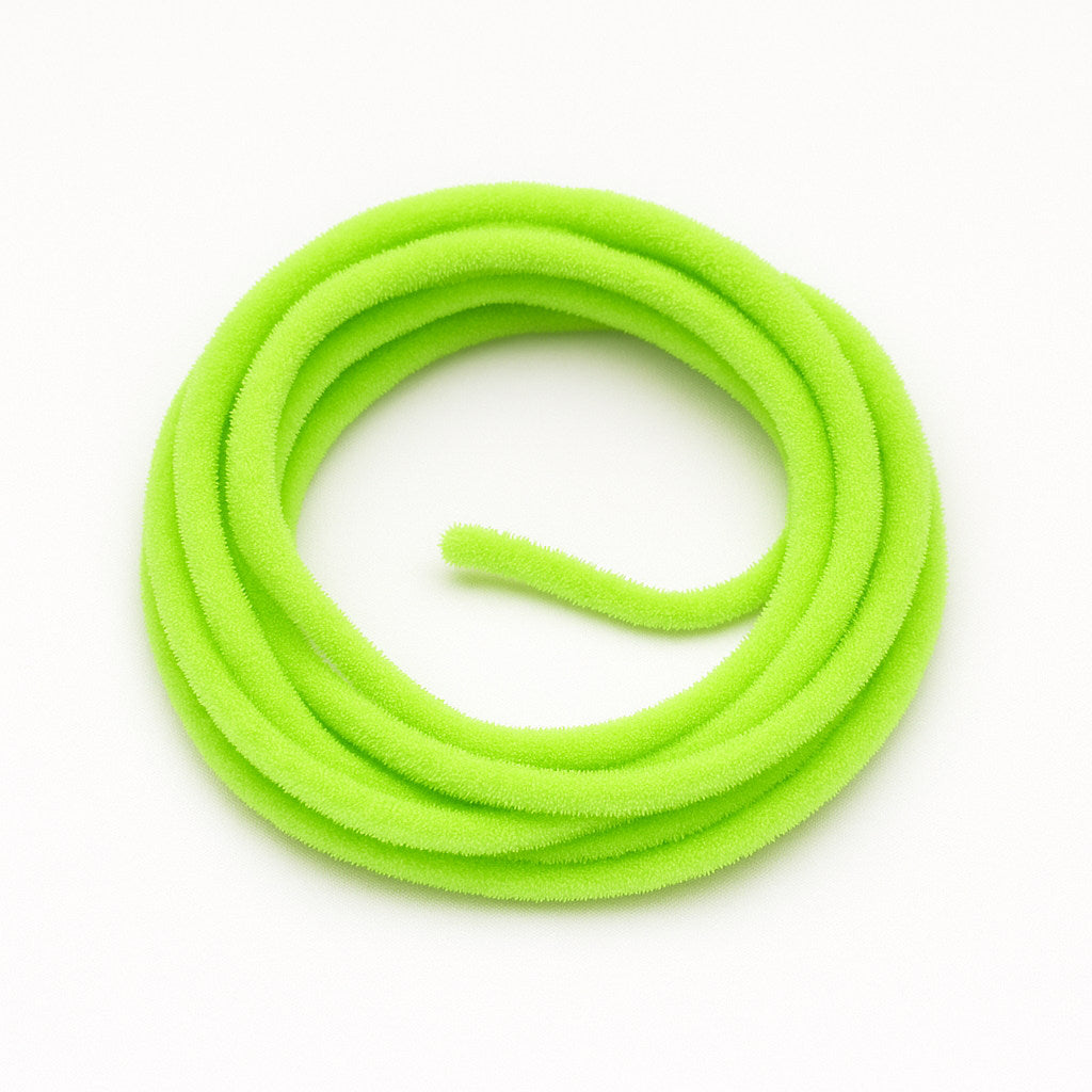 Chartreuse Soldarini Wormstasy Chenille fly-tying material, close-up pulsing fiber texture, studio lighting