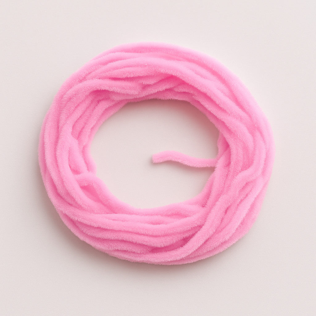 Marshmallow Soldarini Wormstasy Chenille fly-tying material, close-up pulsing fiber texture, studio lighting