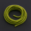 Soldarini Wormstasy Chenille UV – Olive fly tying material on dark background